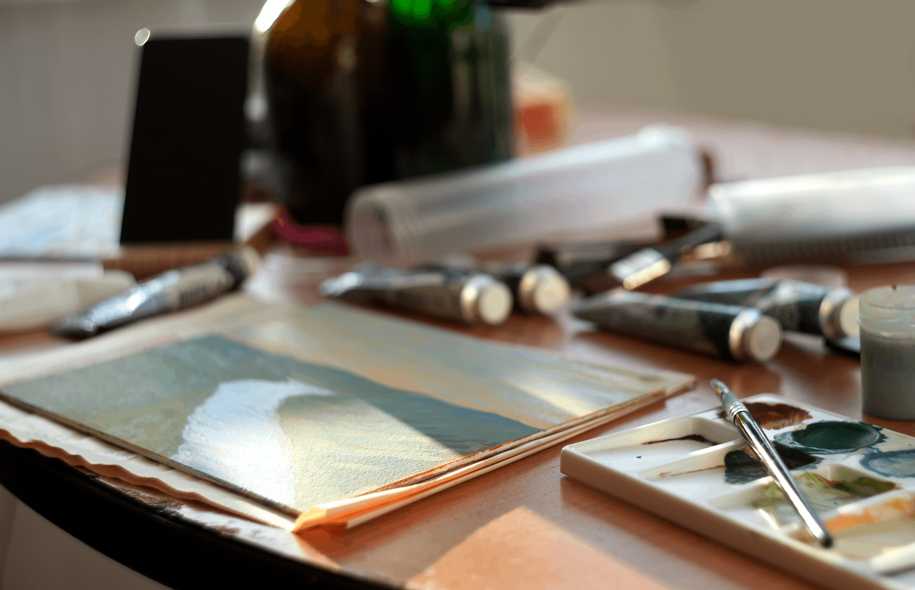 Paintbrushes and colourful paint